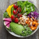 When looking at plant-based vs vegan lifestyles, consider what's involved, from food to other products. Click to learn how these diets compare!