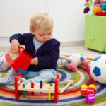 There are a few things you can do if you notice your child is behind in developing gross motor skills. Here are 5 things you can try for your little one.