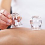 There are different types of massages you can get, including a myofascial cupping massage. Learn what this means and the benefits here.